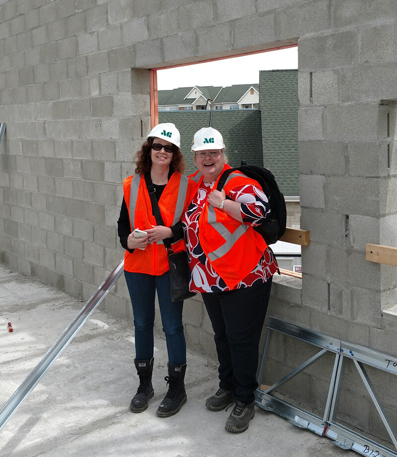 Megan Scott and Ann D'Acquisto team up to oversee work on an AG Architecture project job site.